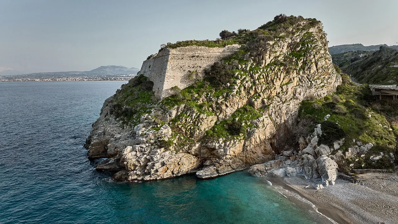 Paleokastro bay with clear water below the old castle near Heraklion Crete Paleokastro bay with clear water below the old castle near Heraklion Crete